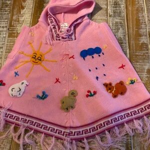 Pink Hooded Knit Poncho with Animal and Weather Motifs